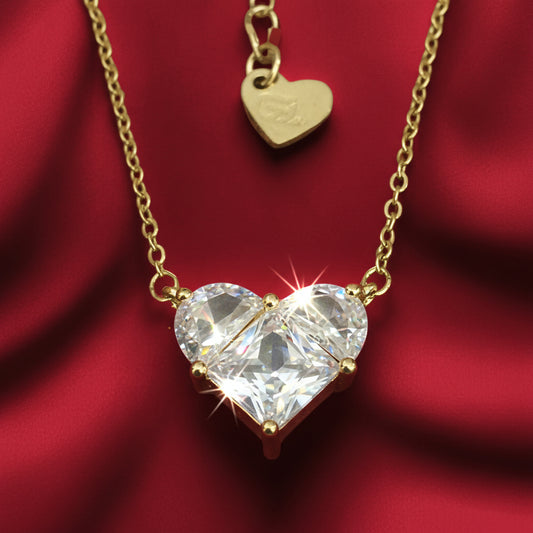 Gold Heart Zircon Necklace on a red background