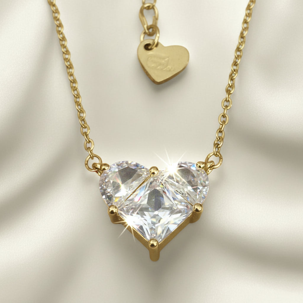 Gold Heart Zircon Necklace on a red background