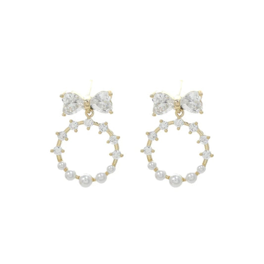 Pair of gold and pearl earrings on a white background