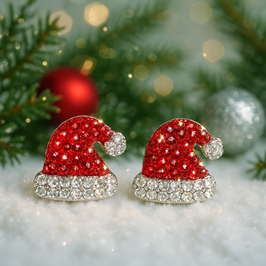 Santa Hat Rhinestone Earrings with sparkling details on a festive background with Christmas decorations.