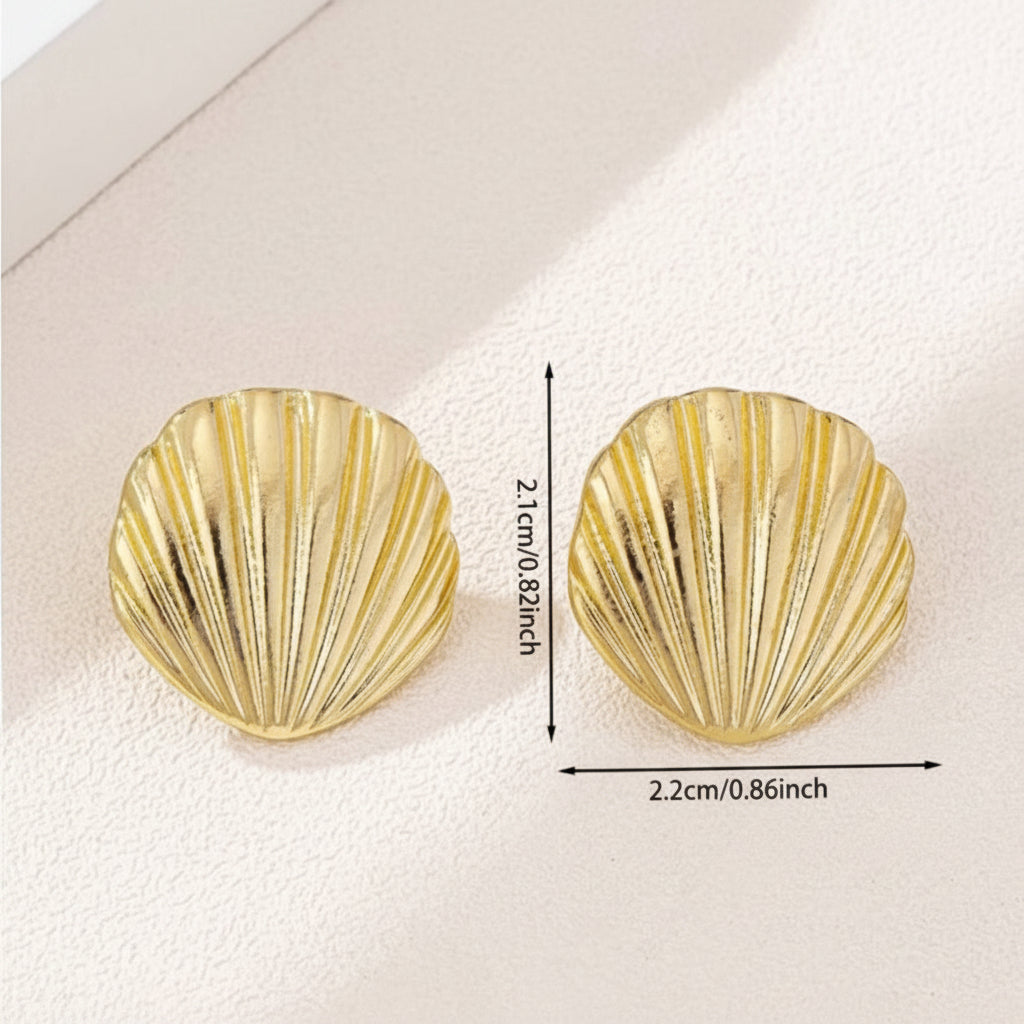 Gold Seashell Statement Earrings with measurements and weight on a light background
