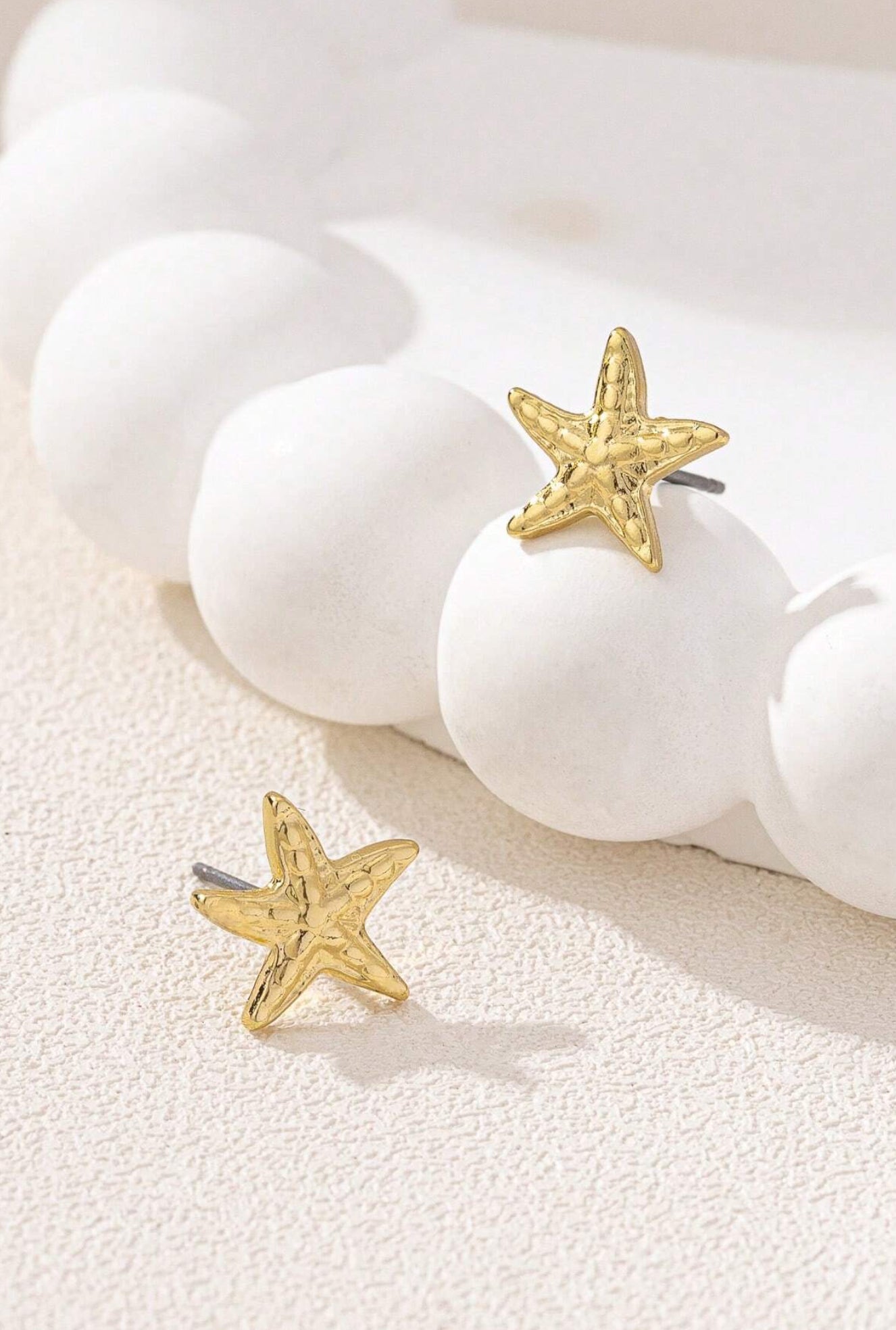 gold starfish earrings