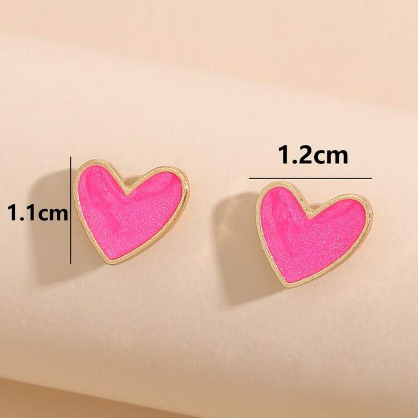 Pink heart earrings with dimensions