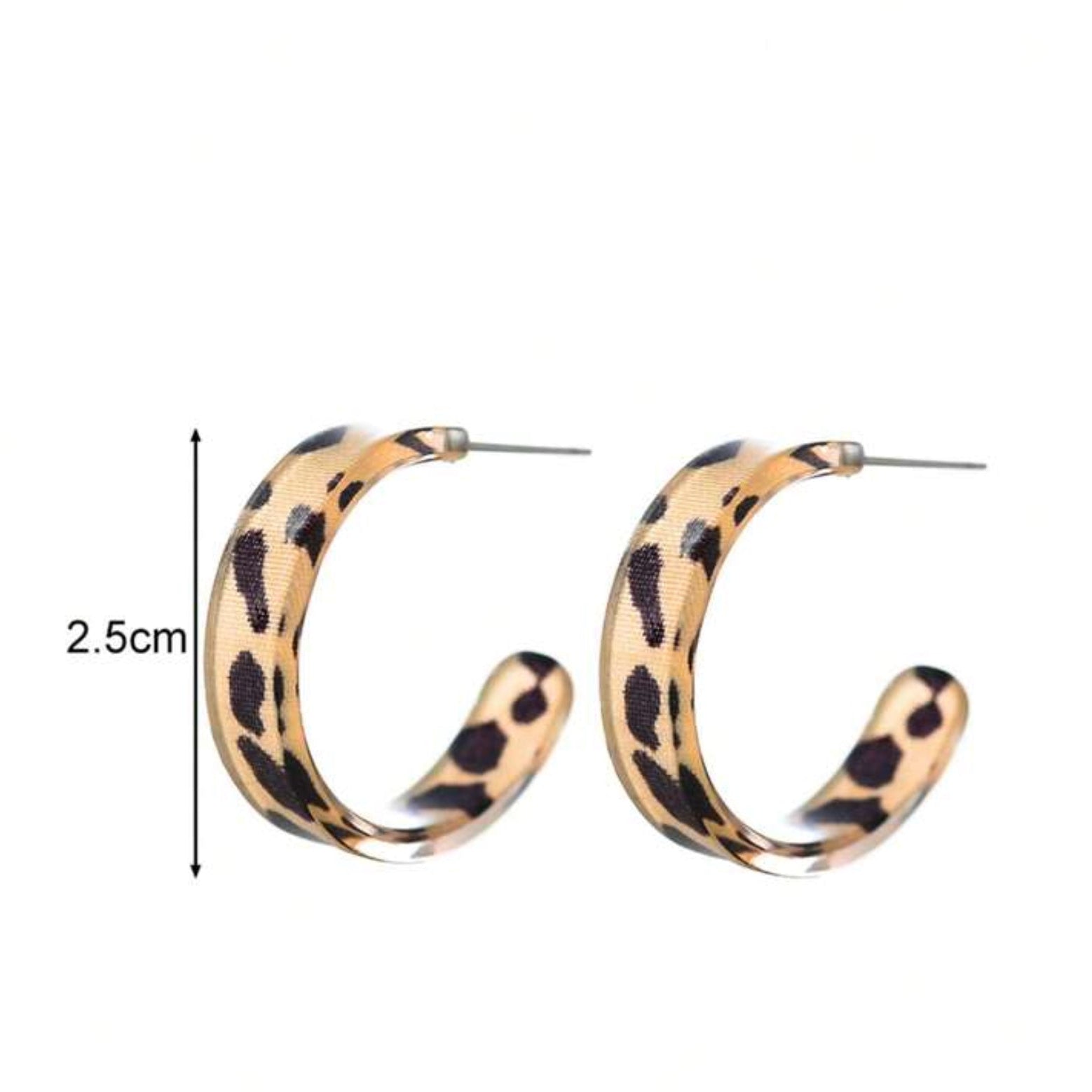 Leopard print hoop earrings with a measurement label on a white background