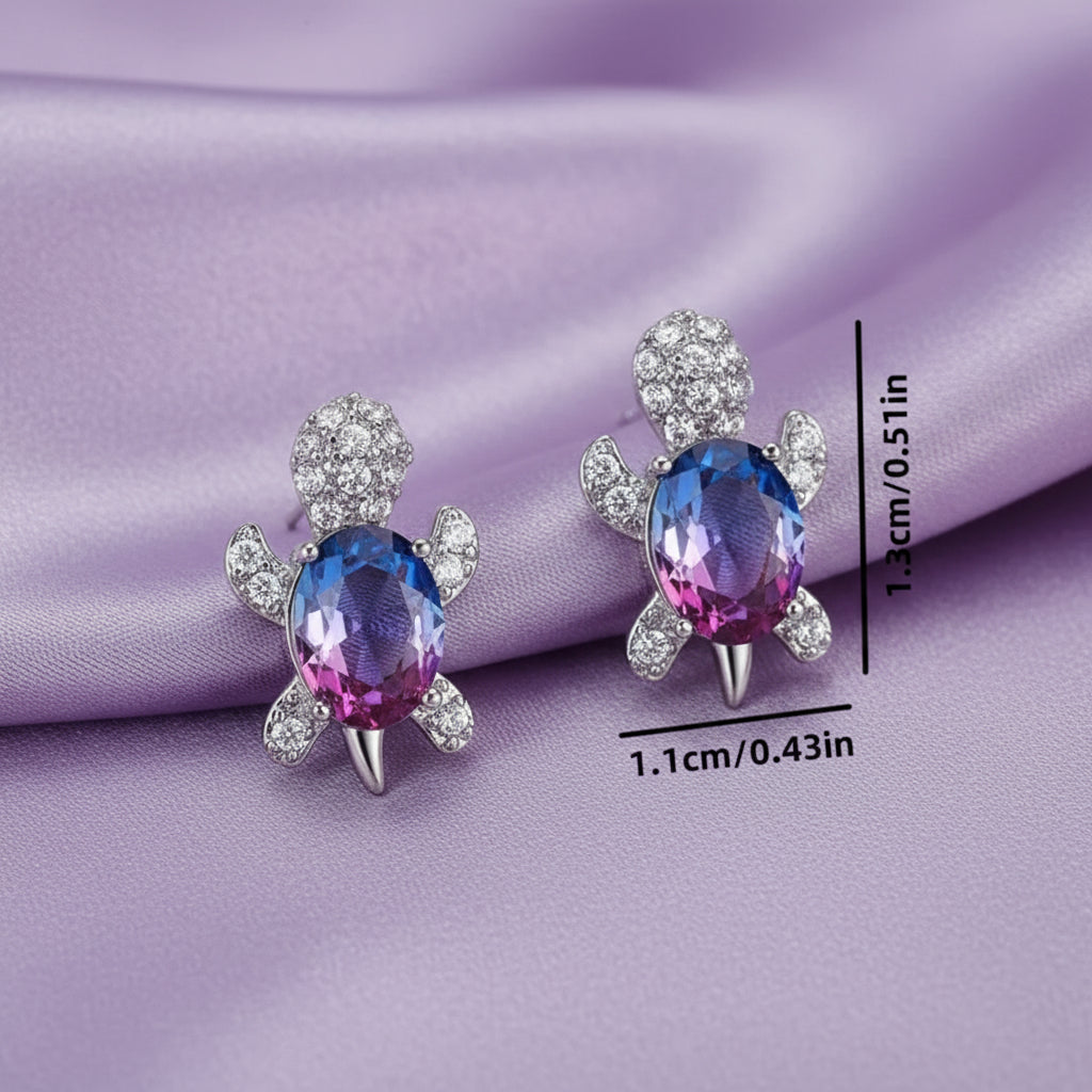Multicolor Crystal Turtle Earrings with colorful gemstones and measurements on a blurred background