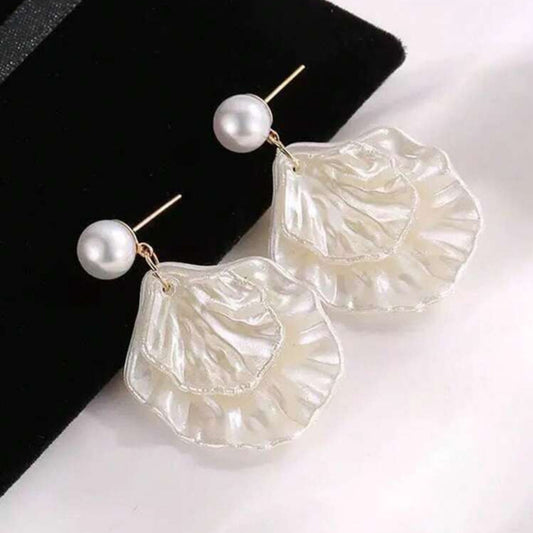 Pearl shell drop earrings with gold post and layered iridescent petal design