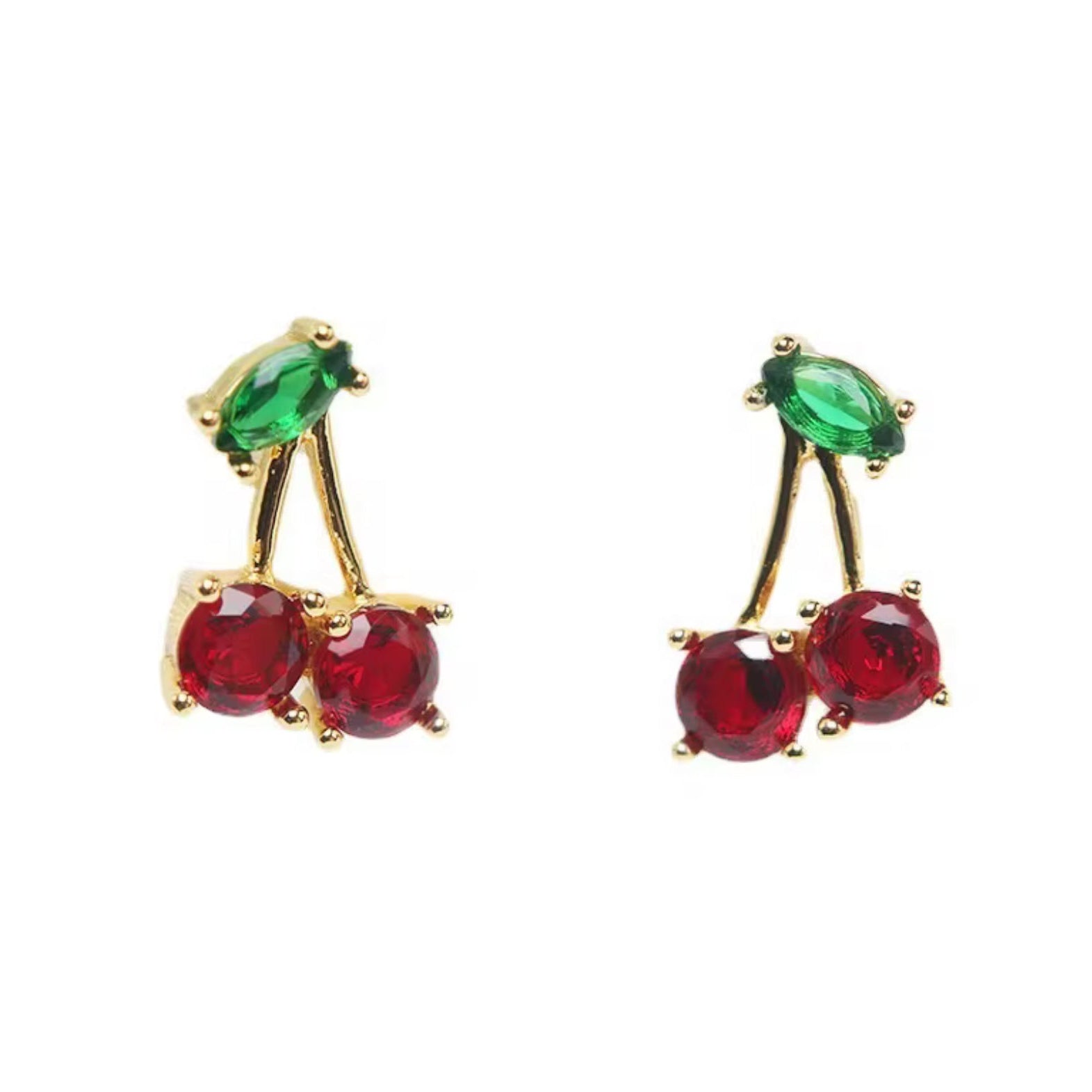 Cherry-themed earrings with red and green gemstones on a white background