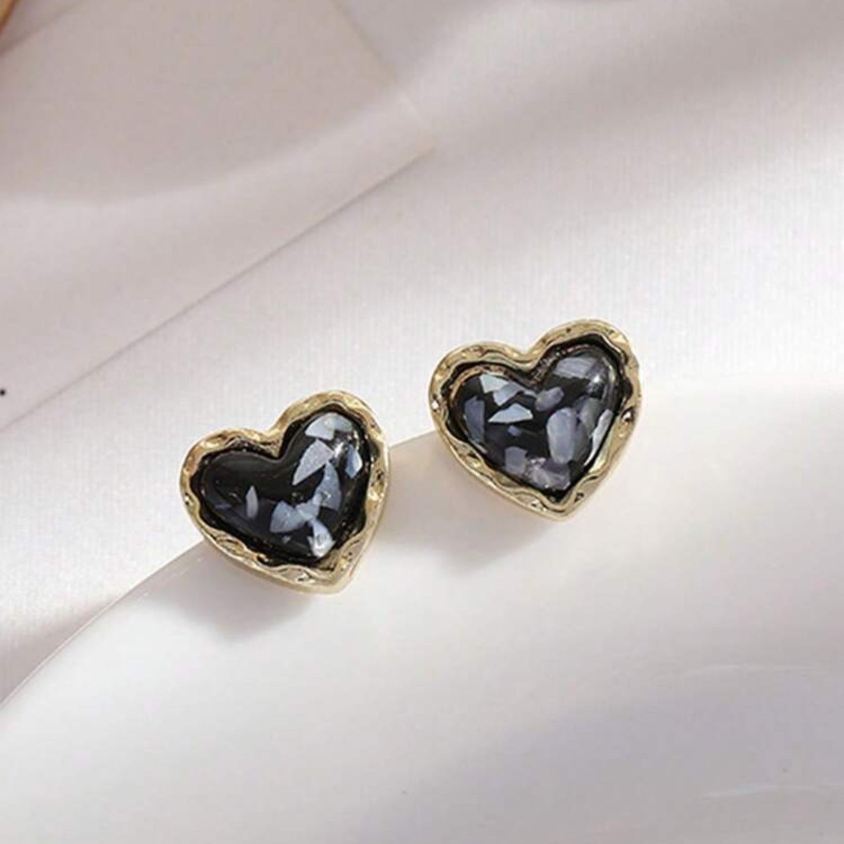 Midnight Mosaic Gold Heart Studs on a light background
