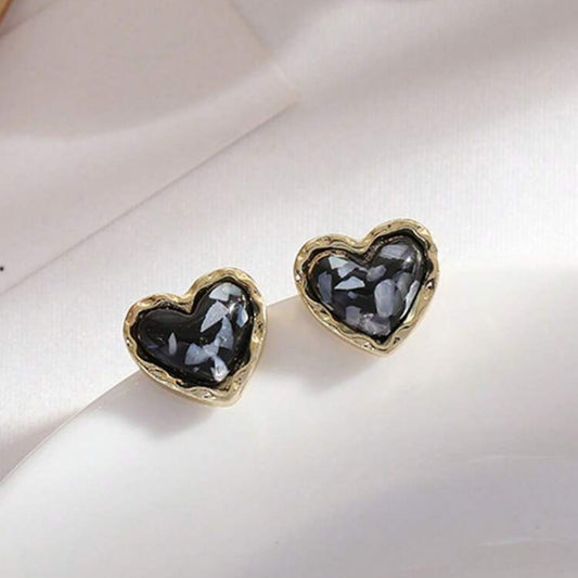 Midnight Mosaic Gold Heart Studs on a light background