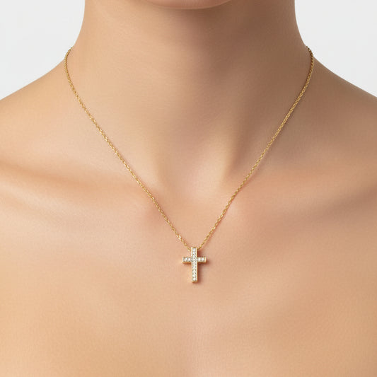 Gold Zirconia Mini Cross Necklace worn by a woman