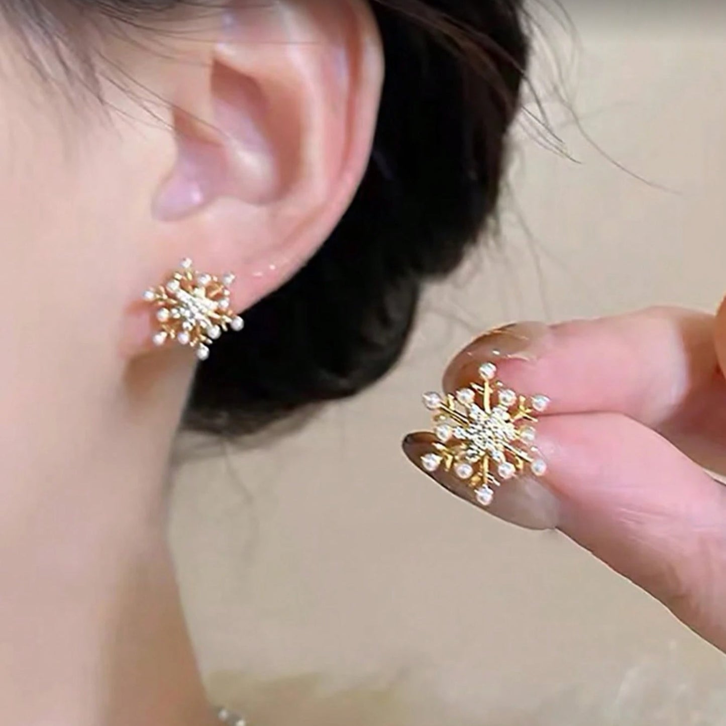 Snowflake Pearl Earring worn by woman