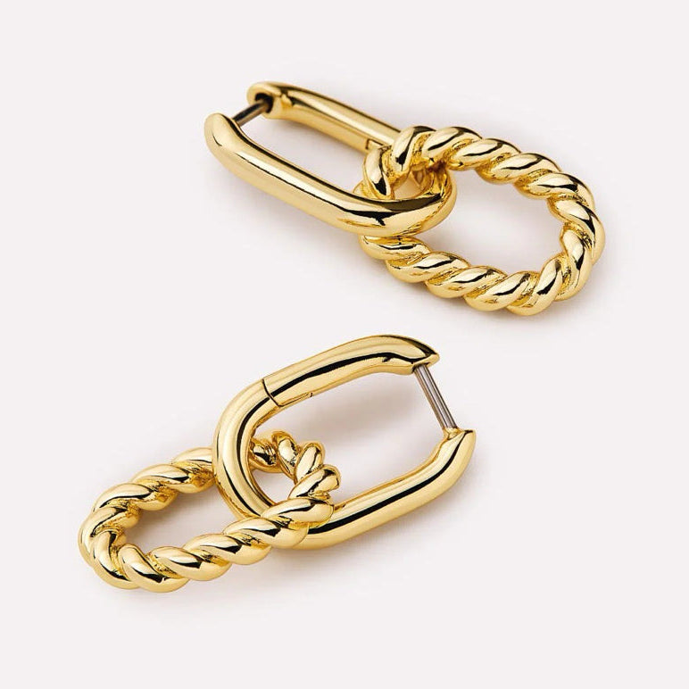 Polished gold hoop earrings with a smooth, classic design