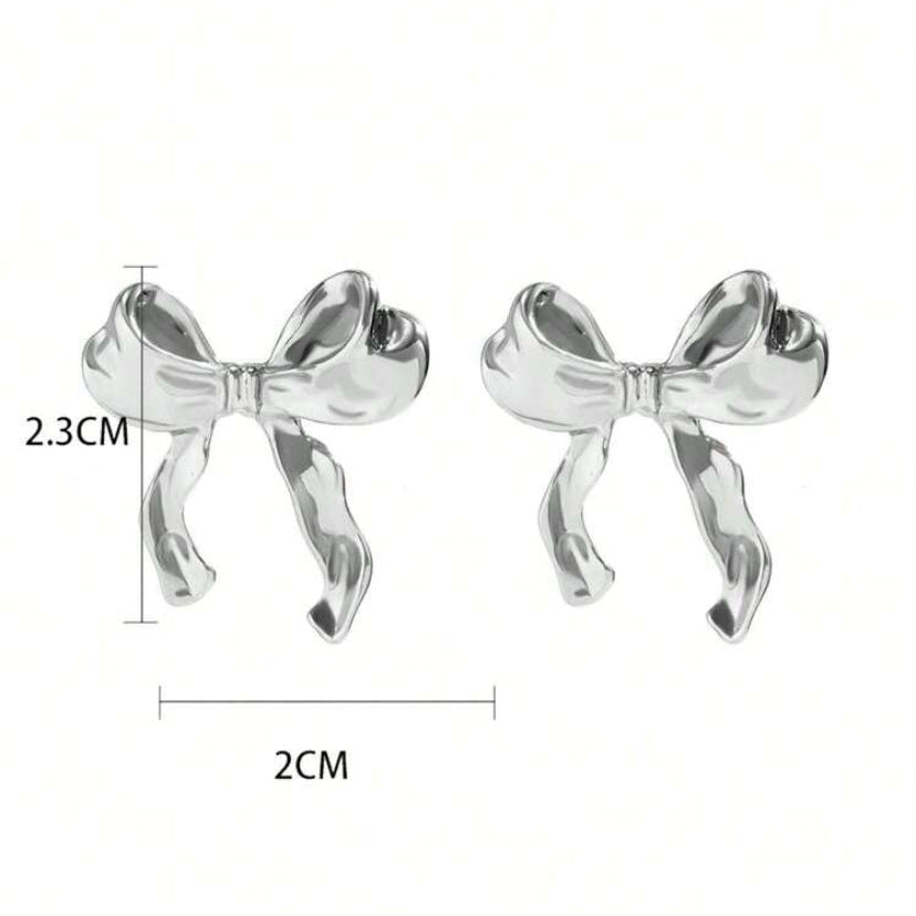 Silver Bow Ribbon Earrings with measurements on a white background