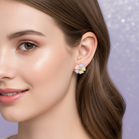 Pastel Petal Blossom Earrings being worn by a young woman.