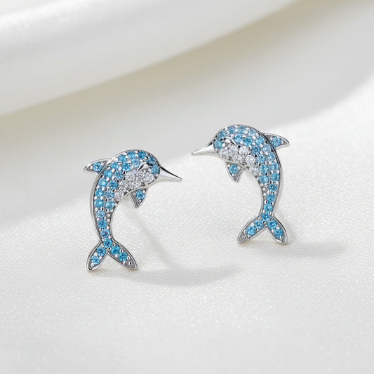 Blue Pavé Dolphin Earrings on white