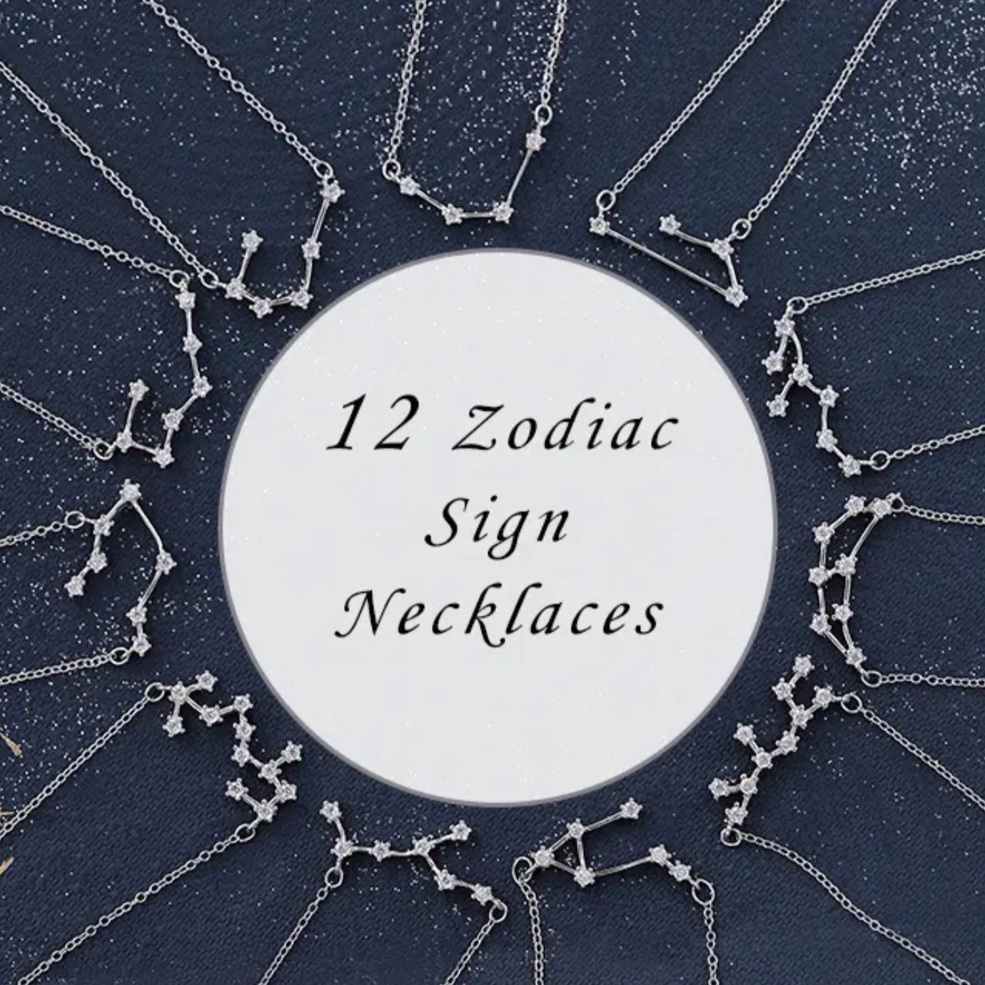 A collection of silver-colored zodiac sign necklaces with cubic zirconia accents, displayed in a circular arrangement with the text '12 Zodiac Sign Necklaces' in the center.