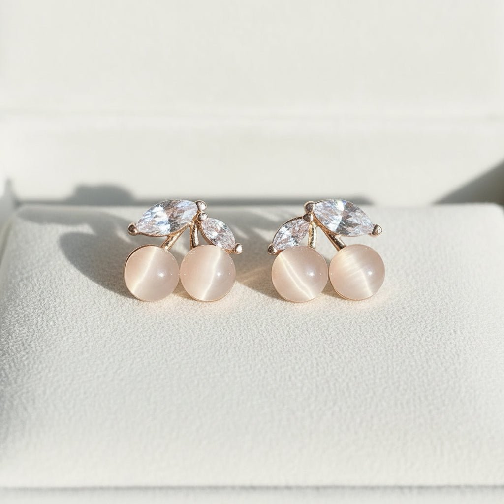 Opalescent Cherry Crystal Earrings on suede
