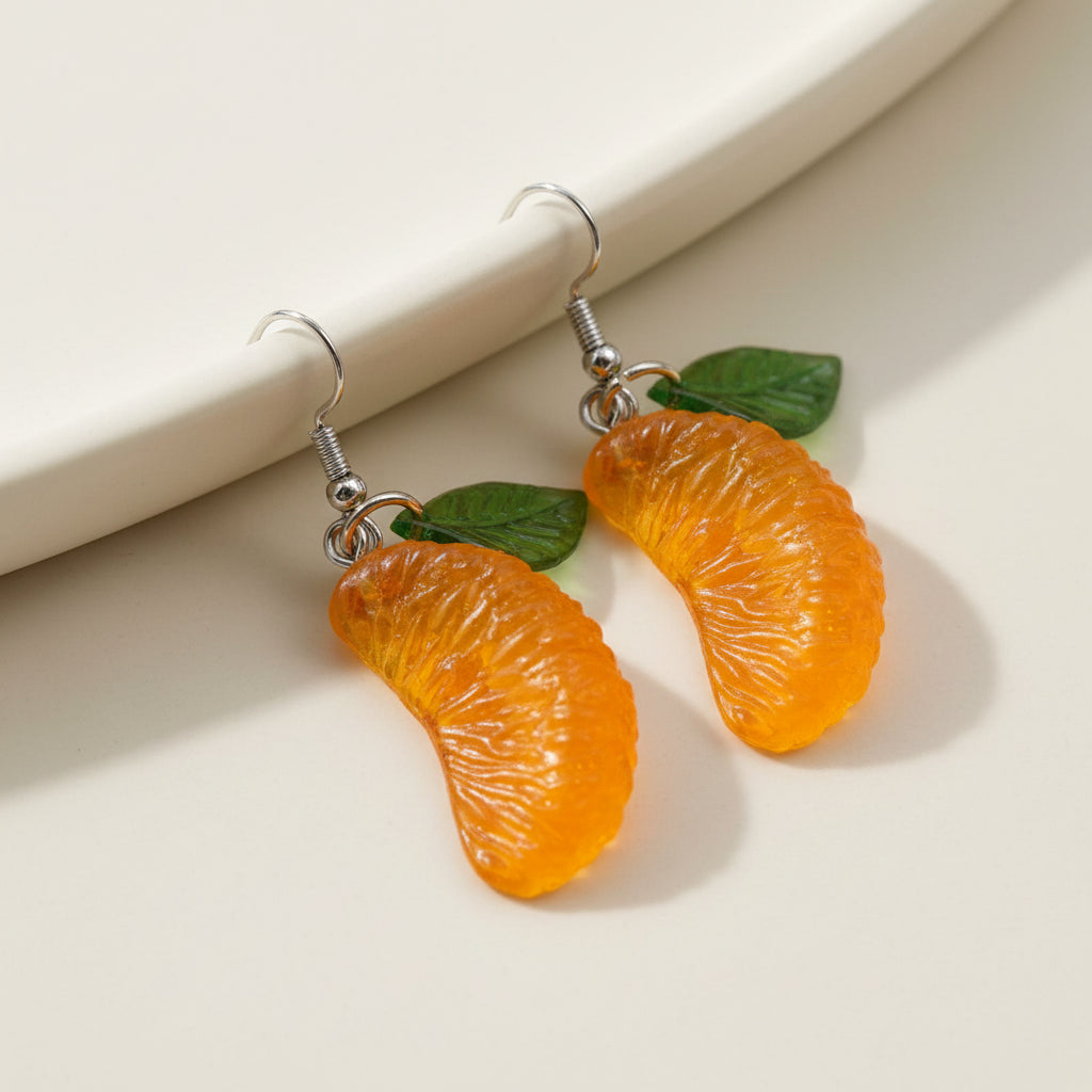 Orange Slice Drop Earrings a white background