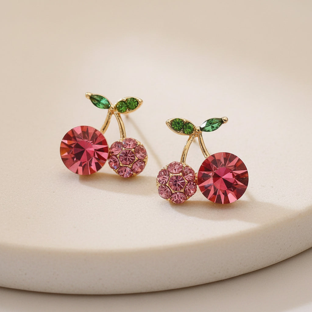 Pink Zircon Cherry Earrings on ceramic