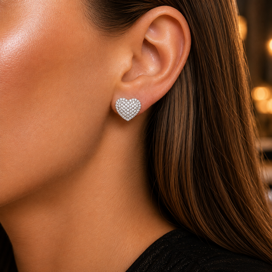 A close-up of a woman's ear wearing a Radiant Heart Pavé Earring
