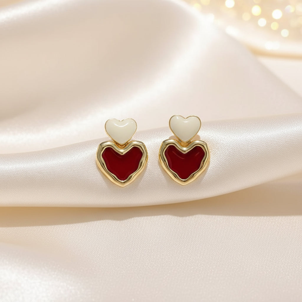 Red & White Double Heart Drop Earrings on white satin