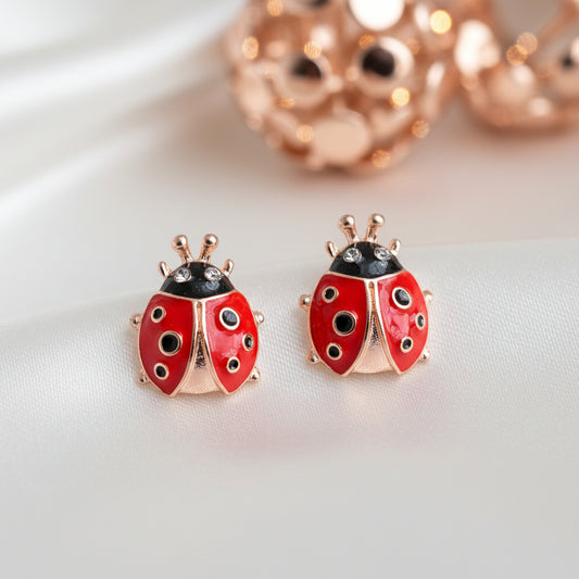 Rose Gold Lucky Ladybug Earrings on rose gold