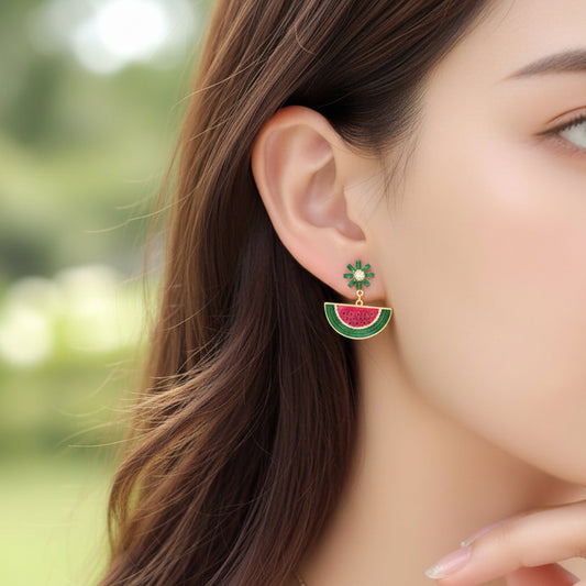 Close-up of a woman wearing a Watermelon Slice Dangle Earring