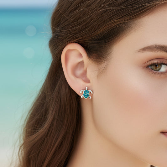 Woman wearing Aqua Pavé Sea Turtle Earring
