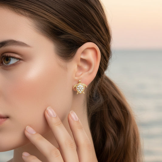 Woman wearing a Gold Pavé Sea Turtle Earring