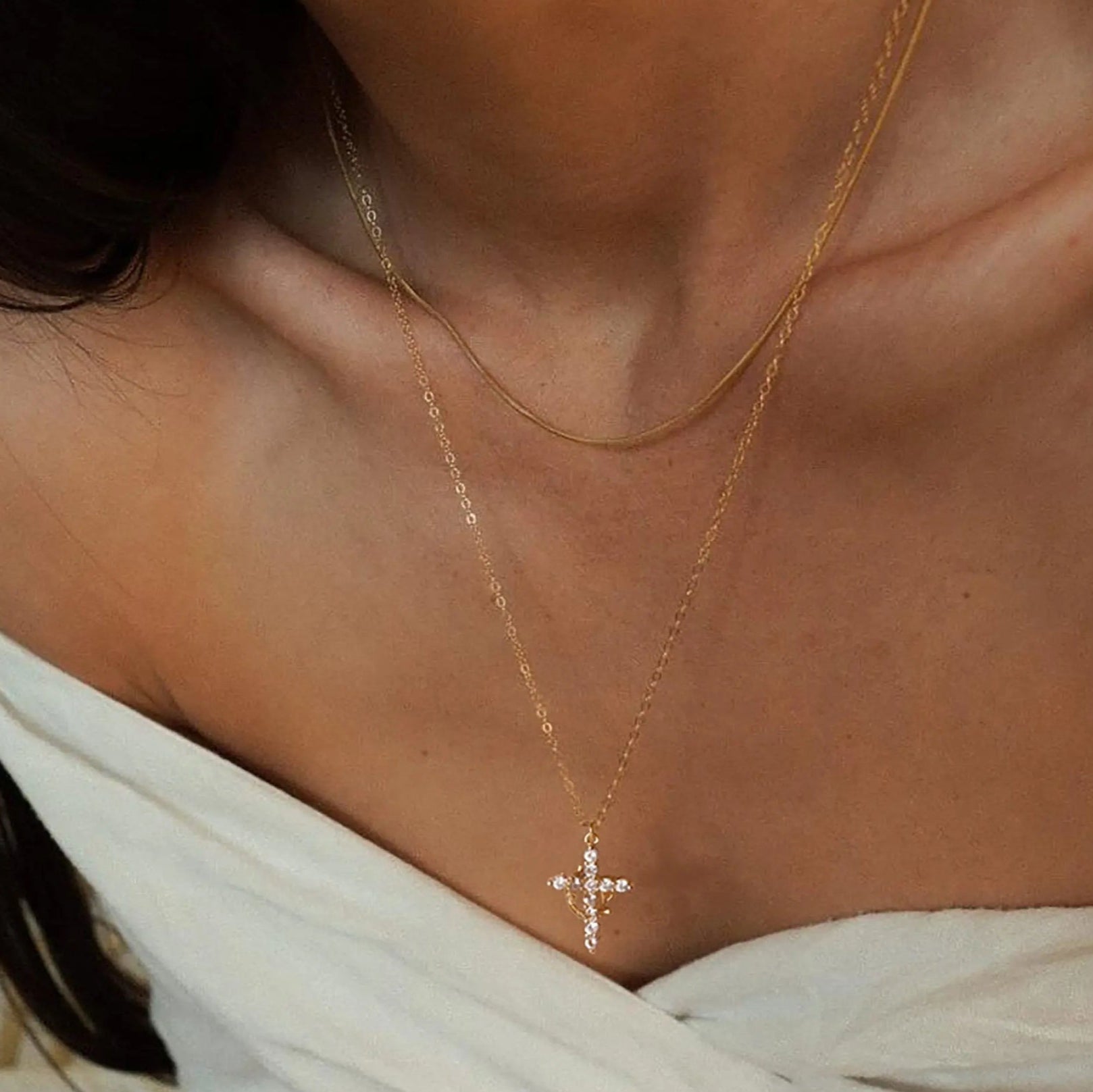 Cross Crown necklace being worn