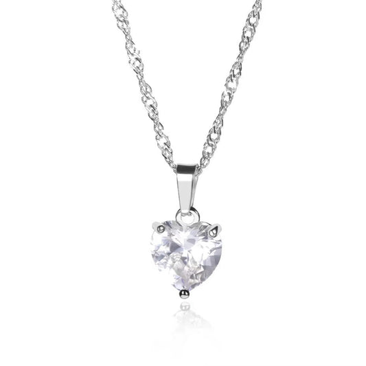 Heart-shaped diamond pendant on a chain against a white background