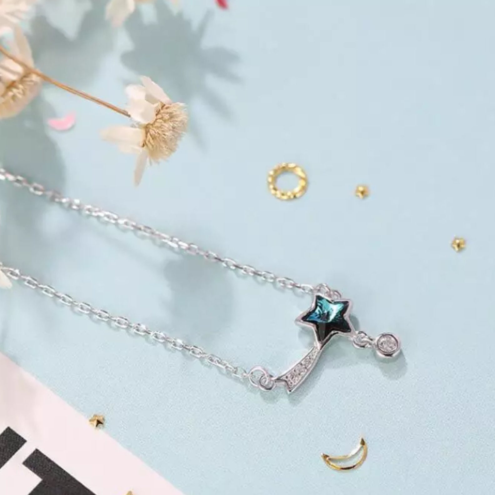 Blue shooting star necklace