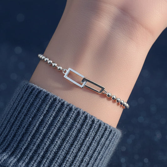 Silver Rectangle Link Bead Bracelet on woman's arm