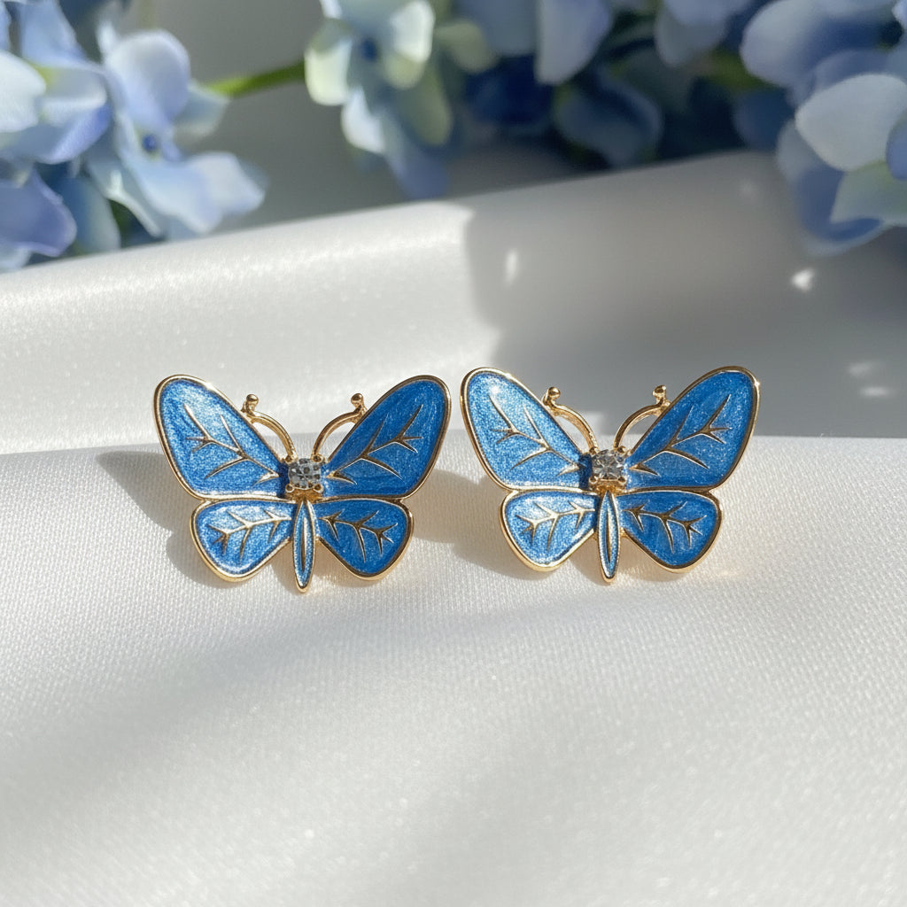 Blue Butterfly Statement Earrings on white