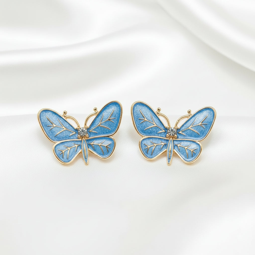 Blue Butterfly Statement Earrings on a white background