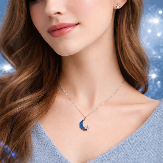 Woman wearing a Blue Crescent Moon Star Necklacewith a sparkling background