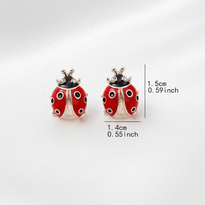 Bold Lucky Ladybug Earrings with measurements on a white background