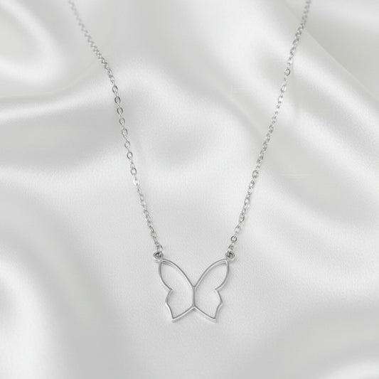 Butterfly Silver Necklace on a natural background