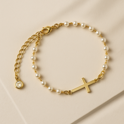 Gold Cross Pearl Bracelet/Anklet on a beige background