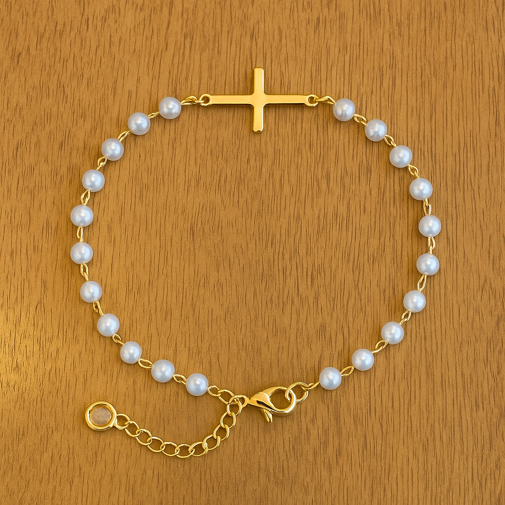 Gold Cross Pearl Bracelet/Anklet on a wooden surface