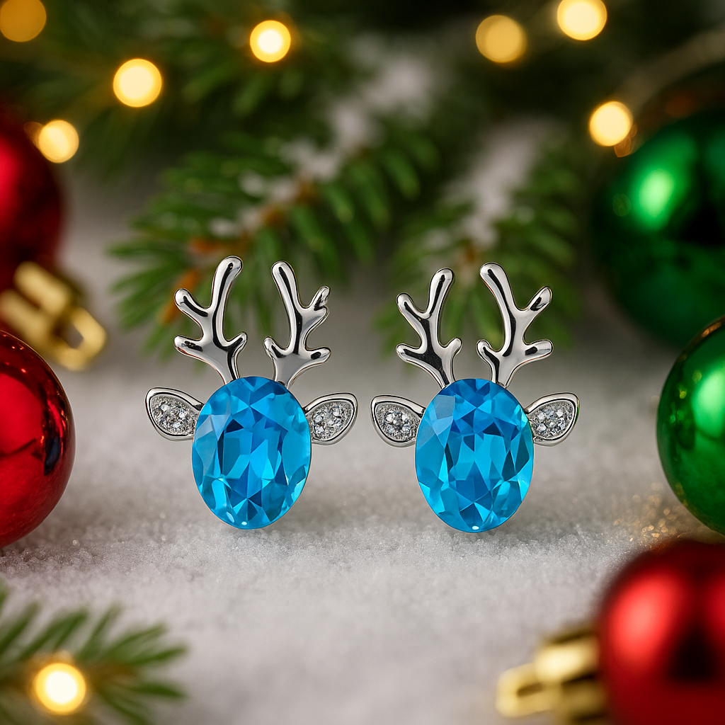 Crystal Blue Reindeer Earrings with blue gemstones on a festive background with Christmas decorations.