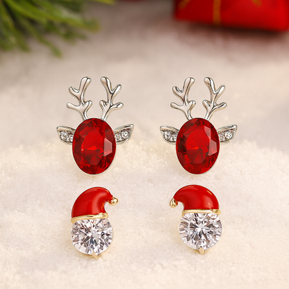 Starlit Santa & Ruby Reindeer Earring Bundle on a soft background.