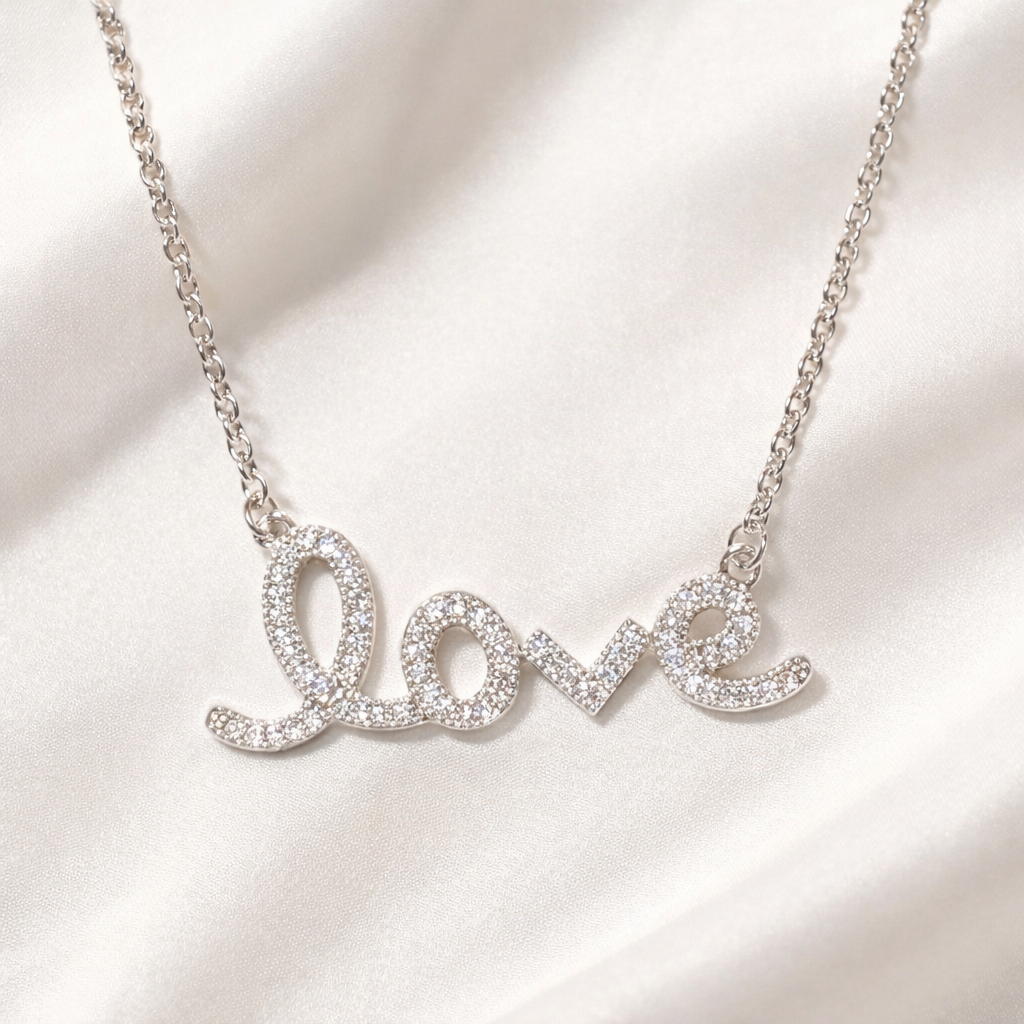 Love Script Rhinestone Necklace on a light background