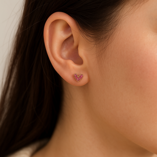 Petite Pink Zircon Heart Earrings with a neutral background
