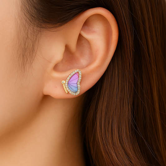 Blue Orchid Butterfly Earrings worn by a person with brown hair.