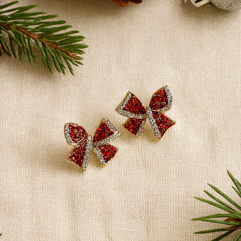 Red Rhinestone Bow Earrings on holiday background