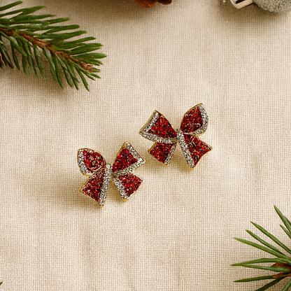 Red Rhinestone Bow Earrings on holiday background