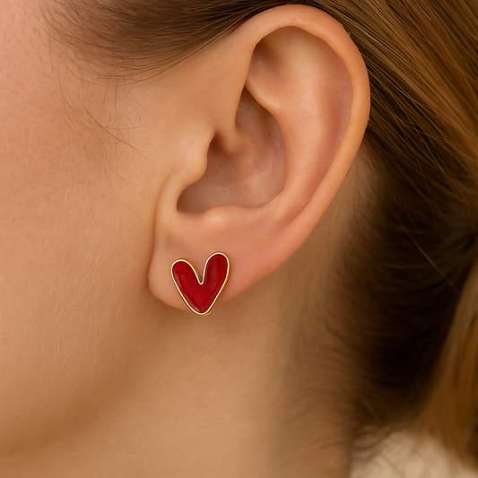 Red Heart Earrings worn by a woman with brown hair.