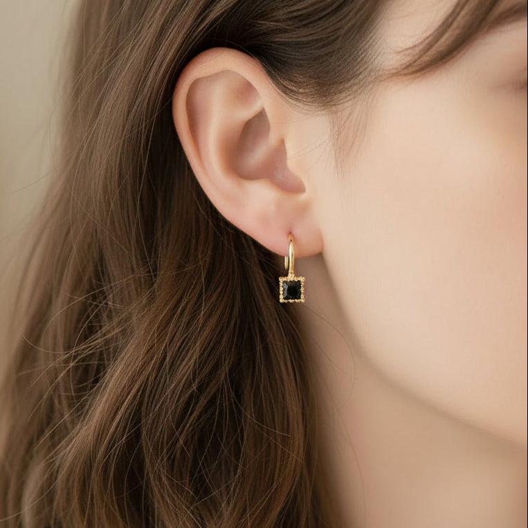 Woman wearing Classic Square Black Drop Earrings