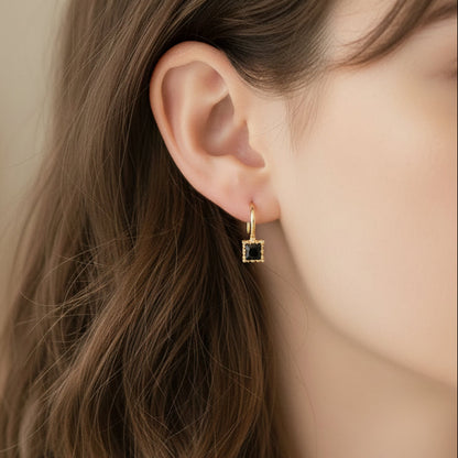 Woman wearing Classic Square Black Drop Earrings